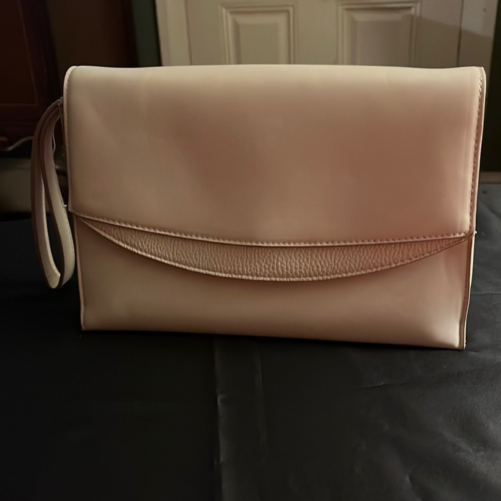 a.new day cream color clutch or wristlet